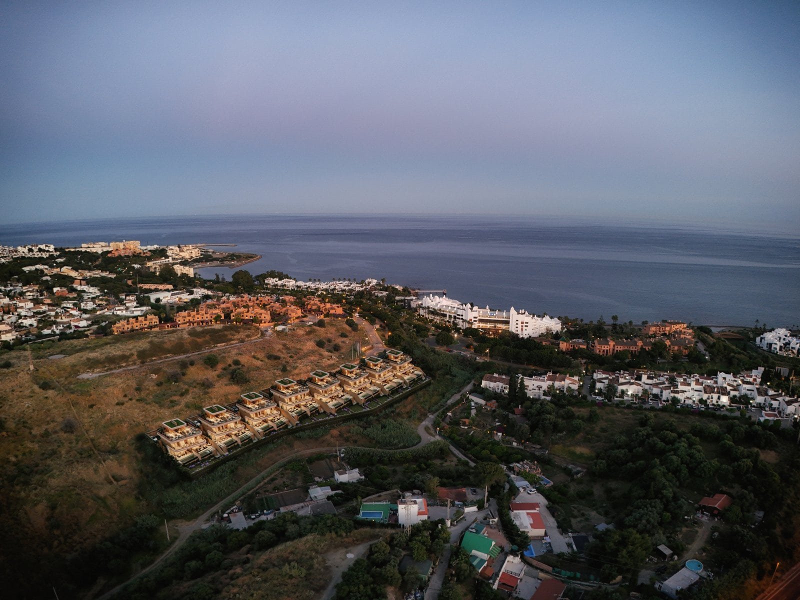Coastal view of Estepona with residential properties overlooking the Mediterranean Sea.