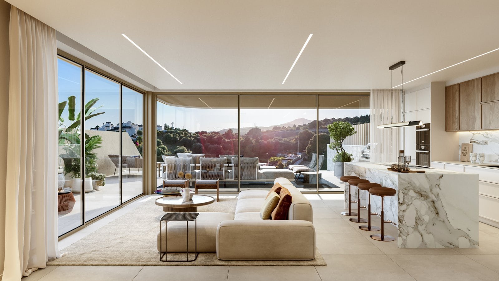 Bright, spacious living room with large windows overlooking Estepona landscape.