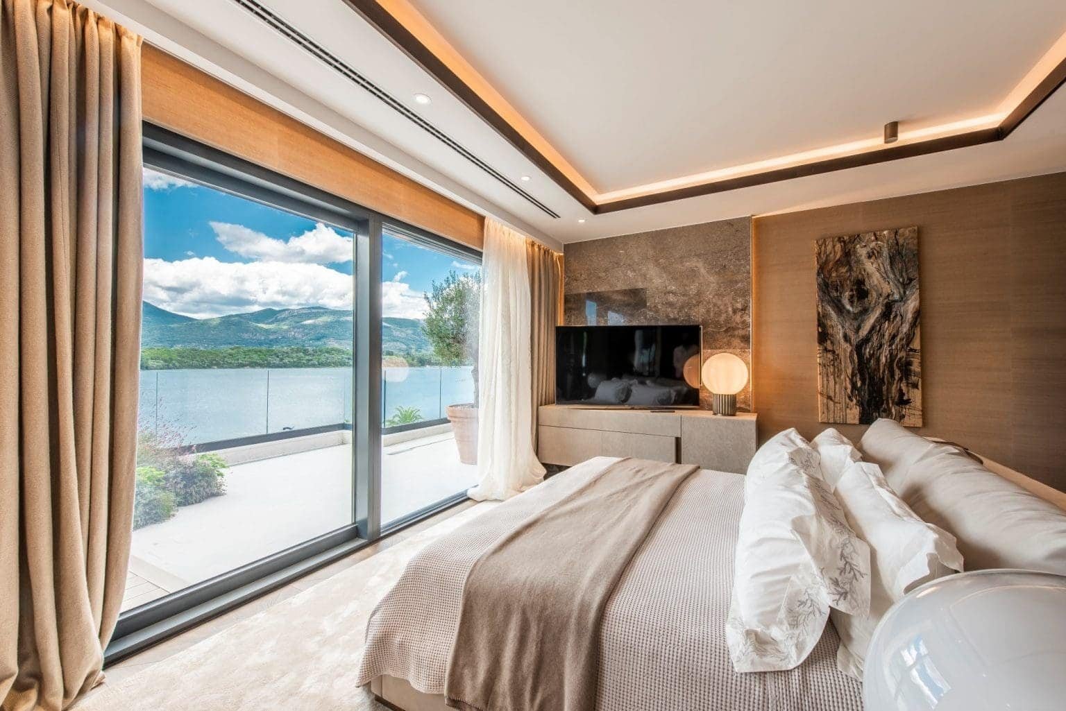 Elegant Nikki Beach Montenegro penthouse with stunning lake views and modern decor. Perfect for luxu.
