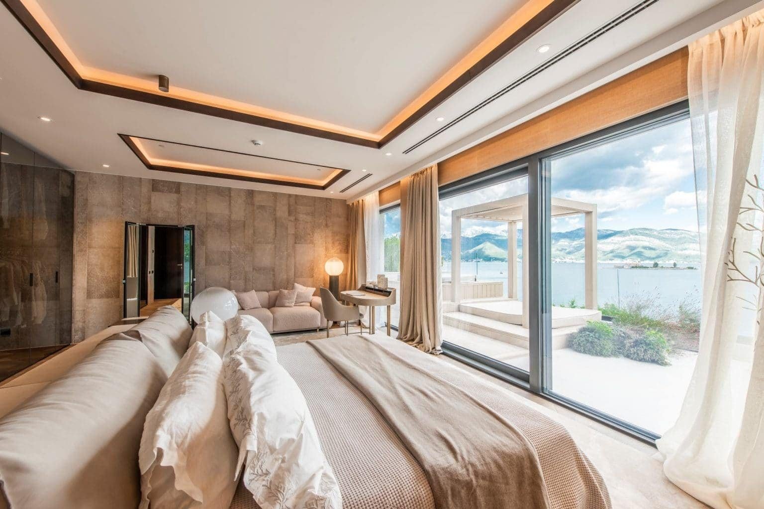 Luxury waterfront penthouse in Tivat with stunning sea views and modern interior design.