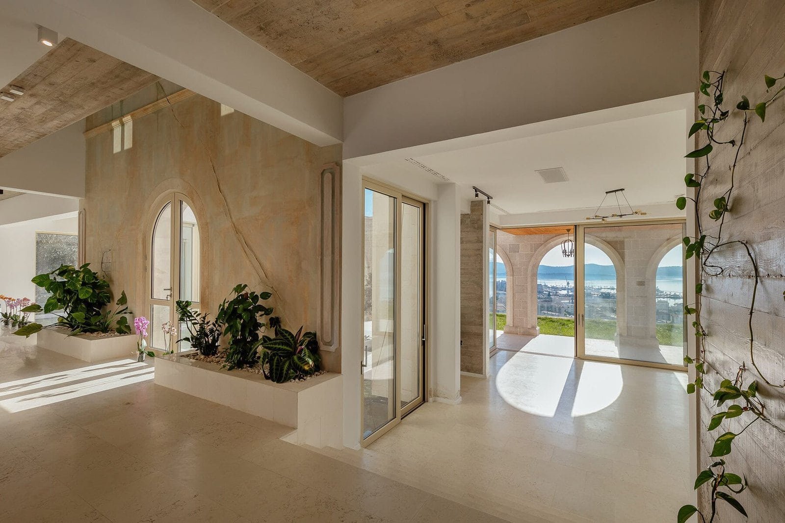 Luxury interior with large windows and scenic views of the outdoors.