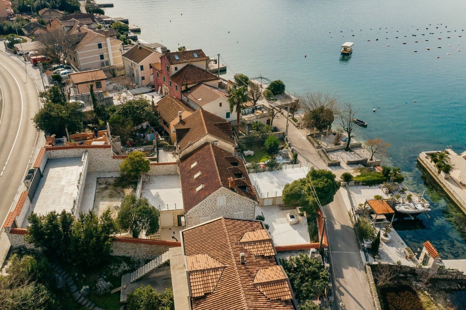 Beachfront residential homes in Barok Estates, overlooking the calm sea.