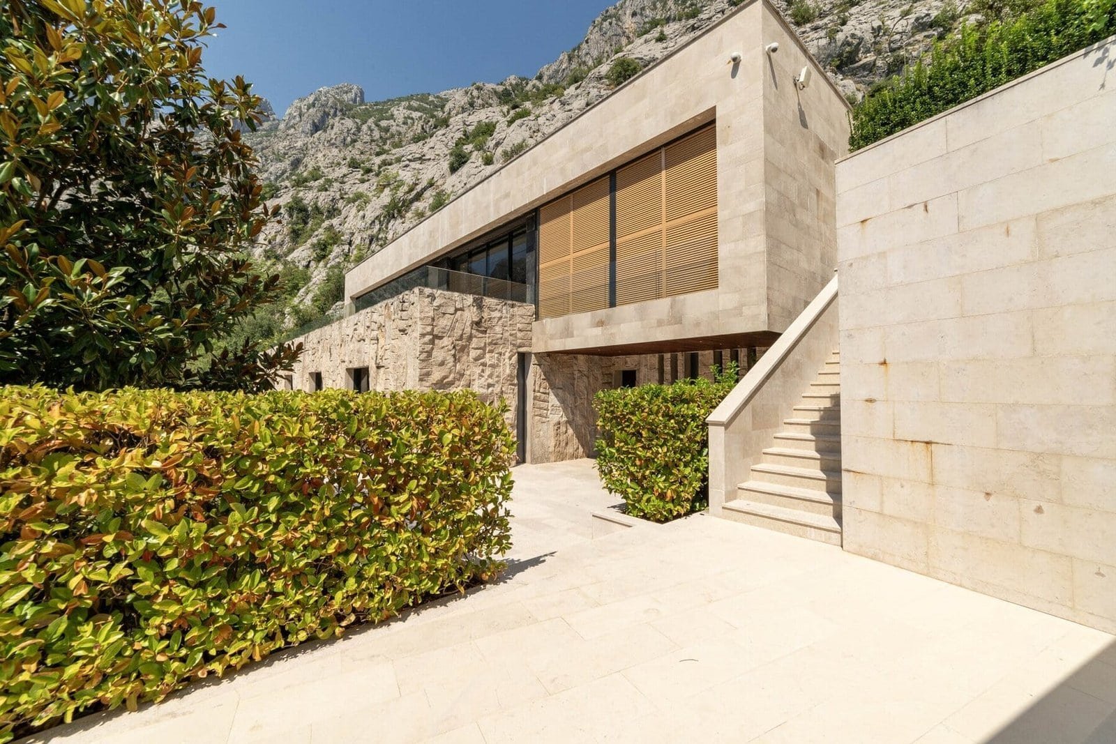 Contemporary mountain villa with sleek design and natural stone accents.