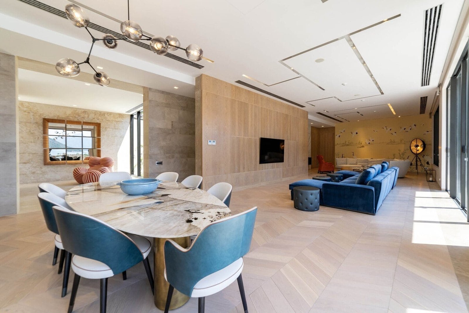 Elegant living room featuring contemporary furniture and large windows for natural light.