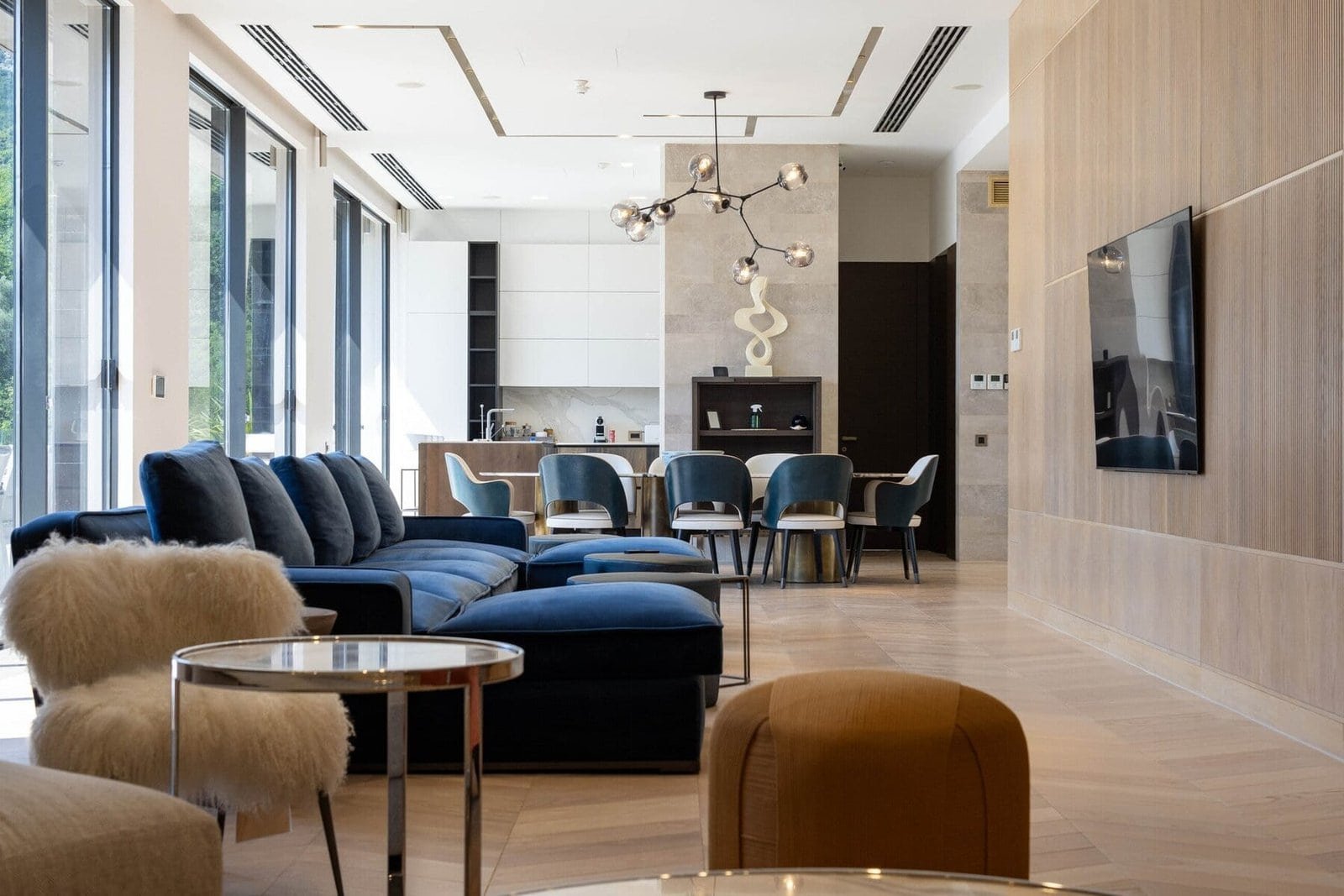 Elegant contemporary living space with spacious seating and natural light.