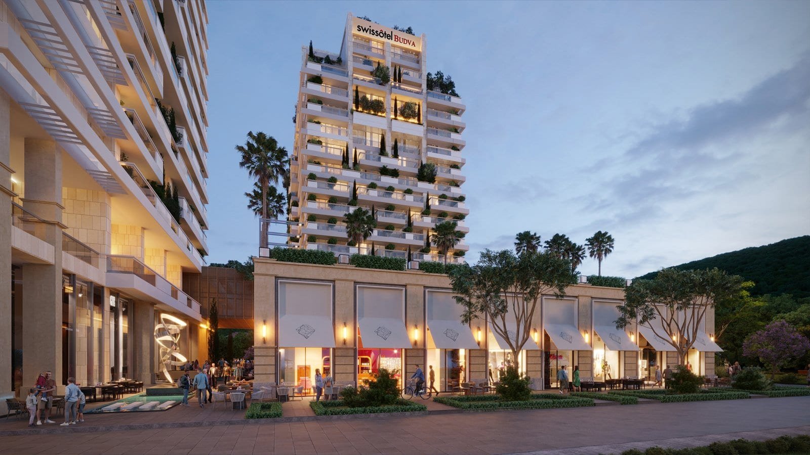 Luxury residential complex with modern architecture and lush landscaping in a scenic setting.