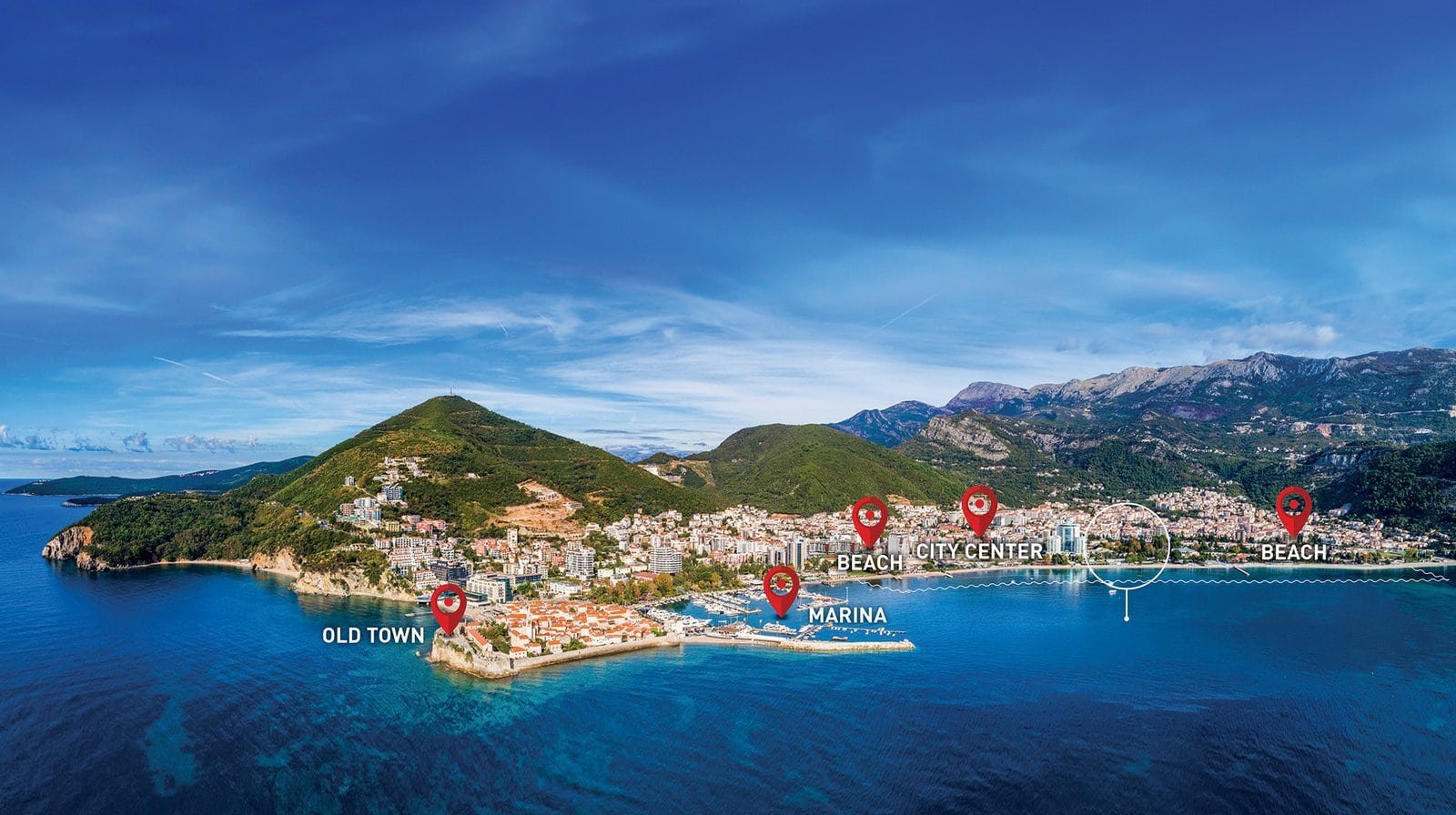 Aerial view of Barok Estates' prime waterfront property with beaches, marina, and Old Town in the ba.