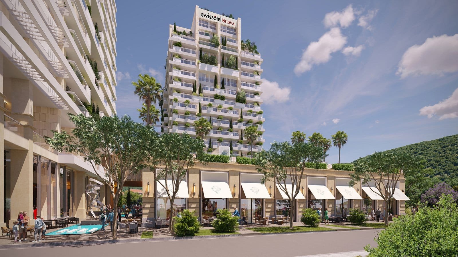 Modern high-rise building with retail shops and apartments, surrounded by greenery and palm trees in.