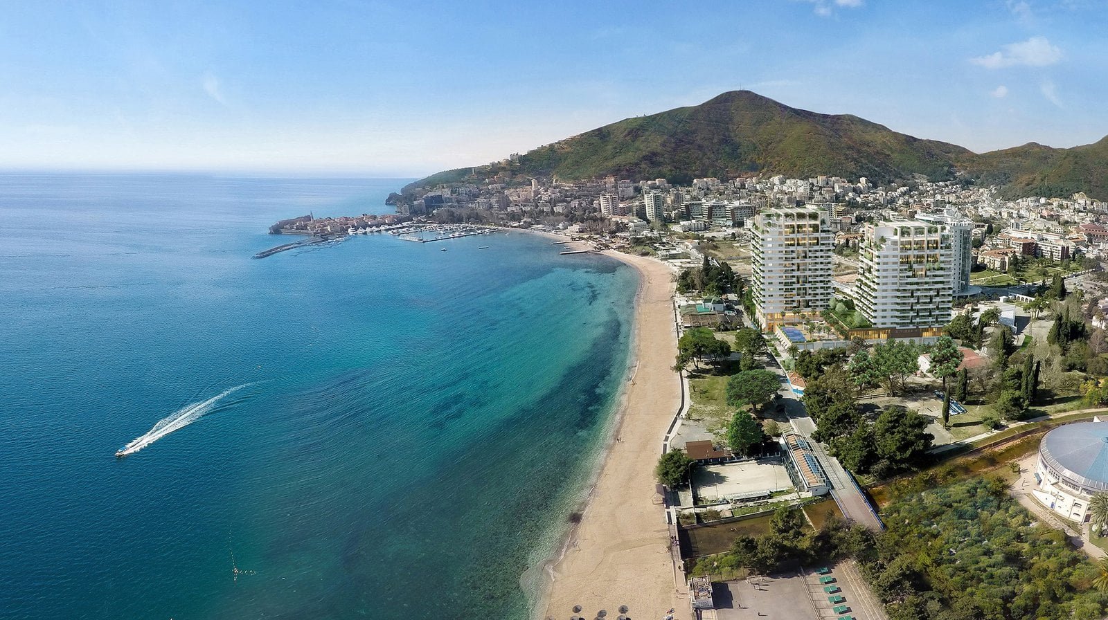 Stunning aerial view of Santa Monica beachfront with luxury real estate and scenic ocean backdrop.