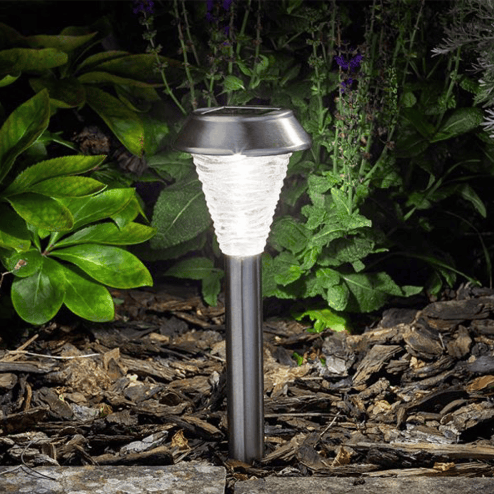 Solar garden light, outdoor stake light, LED pathway illumination, garden aesthetic lighting, eco-friendly garden lamp.