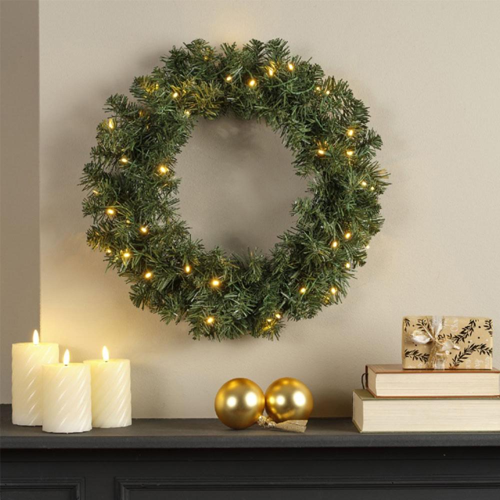 Festive holiday wreath with lights at Bayton Horticulture Centre, Christmas decoration ideas.