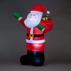 Festive Santa inflatable decoration at Bayton Horticulture Centre for Christmas gardening displays.