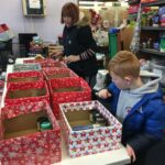 Happy Jarrow schoolboy wins trophy for providing a helping hand at food bank