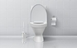 A clean white toilet with open lid sits by a tiled wall, showing the comfort and care Black Diamond Experts bring to your home.