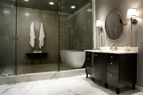 A safe, modern bathroom with marble floors and sleek fixtures—your comfort protected by Black Diamond Experts, Utah’s 24/7 pros.