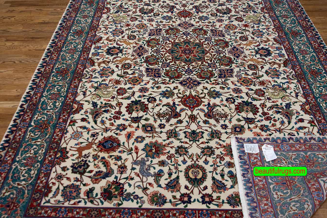 Hand knotted old Persian Tabriz rug with beige and green colors. Size 6.9x10.2.