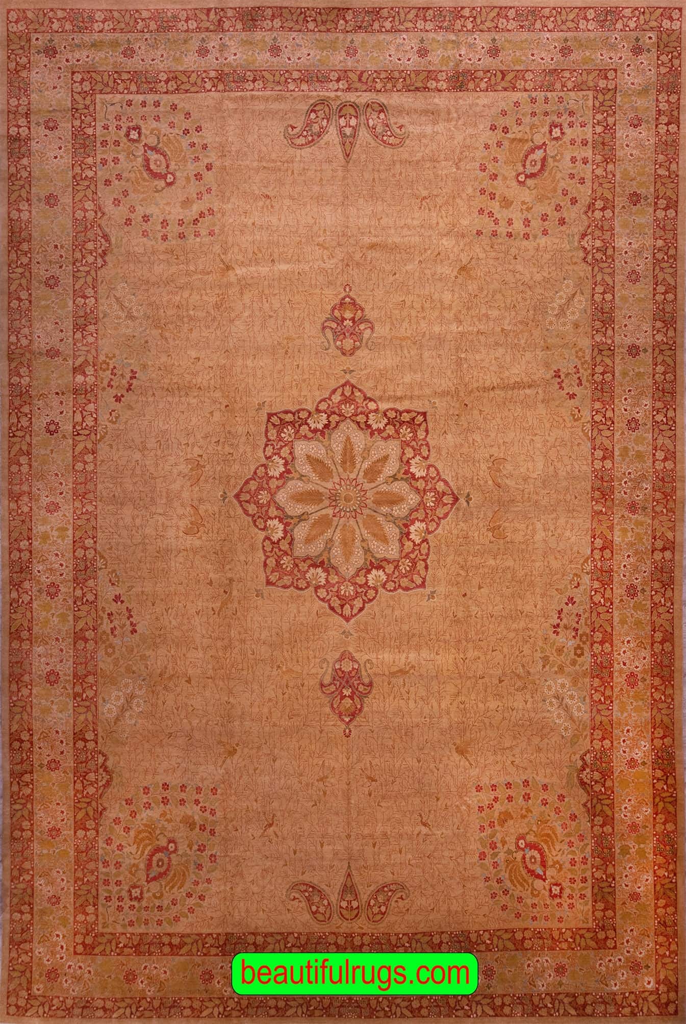 12 x 18 rug, beige color hand knotted Persian Tabriz design rug make in Pakistan. Th actual rug size is 12.10x18.4.