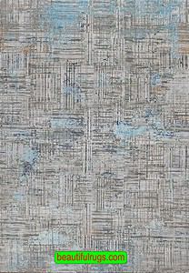 Handmade modern rug in gray color, made in India. Size 4.10x6.10