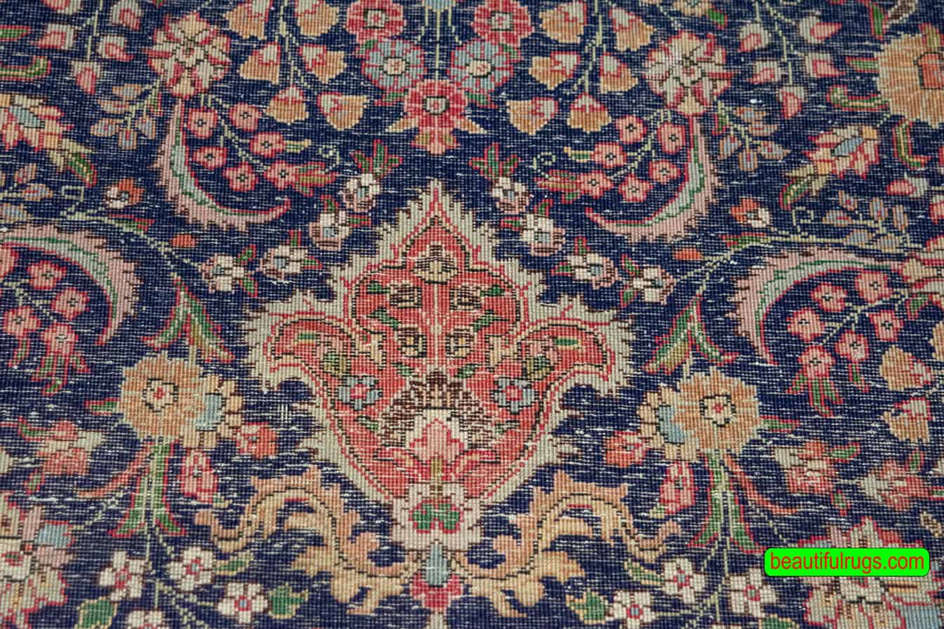 Hand knotted Persian Tabriz wool rug in navy blue and salmon color. Size 6.8x10.