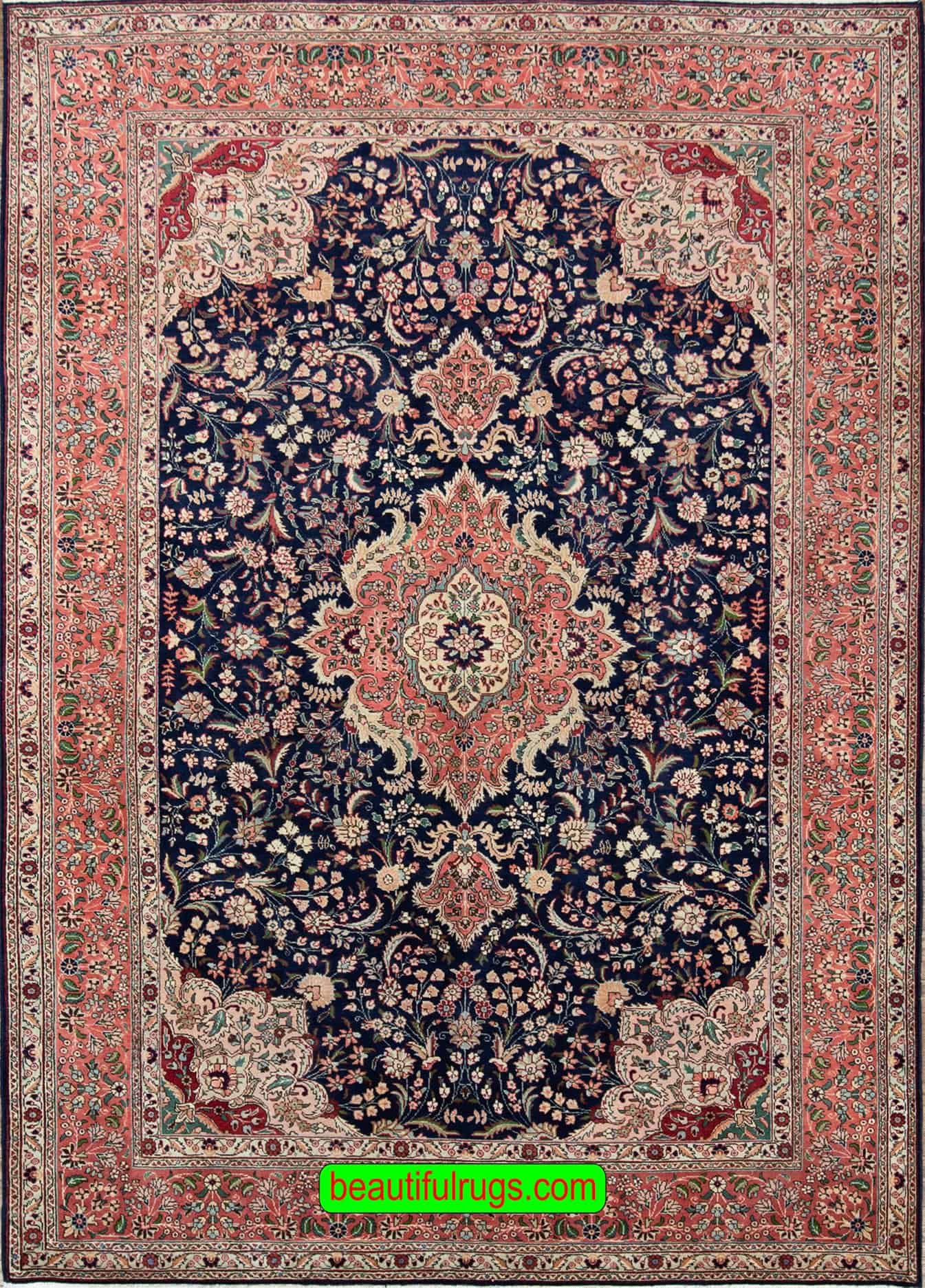 Hand knotted Persian Tabriz wool rug in navy blue and salmon color. Size 6.8x10.