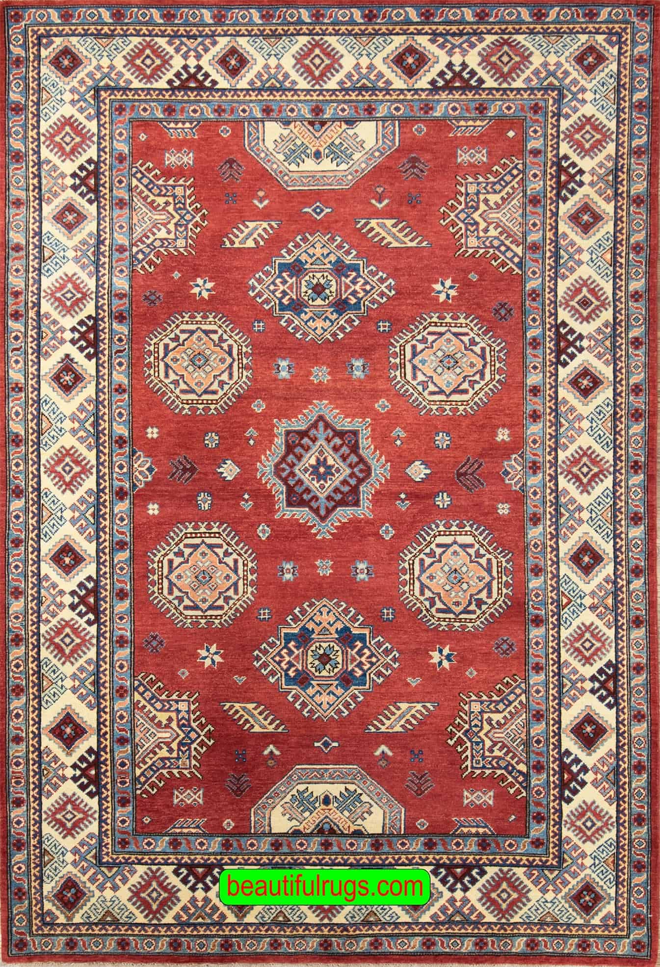 Handmade geometric Kazak style rug in red color. Size 6x9.4.