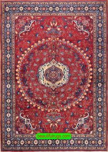 Handmade Persian Tabriz rug in red color. Size 6.10x10.2.