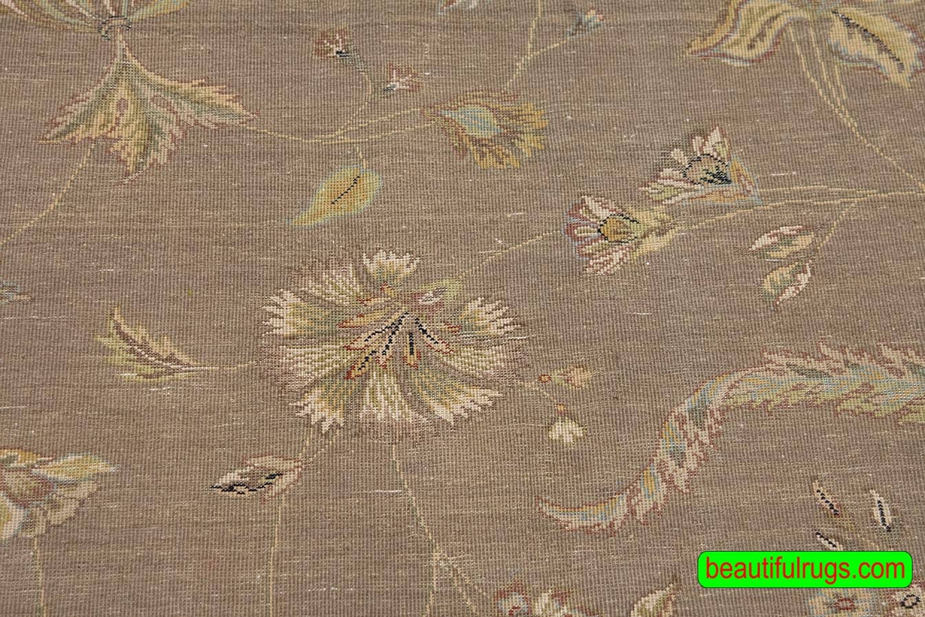 Floral transitional wool and silk area rug with olive green and brown colors. Size 8x10.