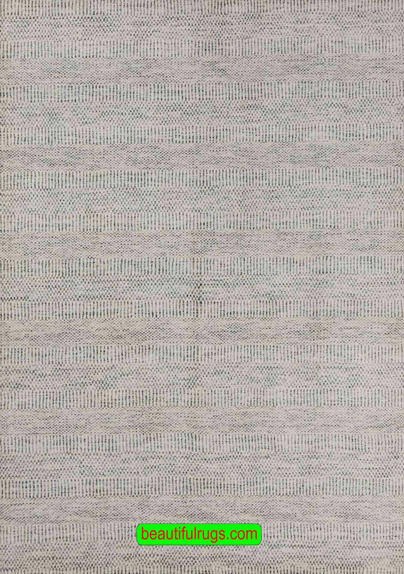 Contemporary rug made in India with gray and beige colors. Synthetic fiber. Size 4.1x6.3.