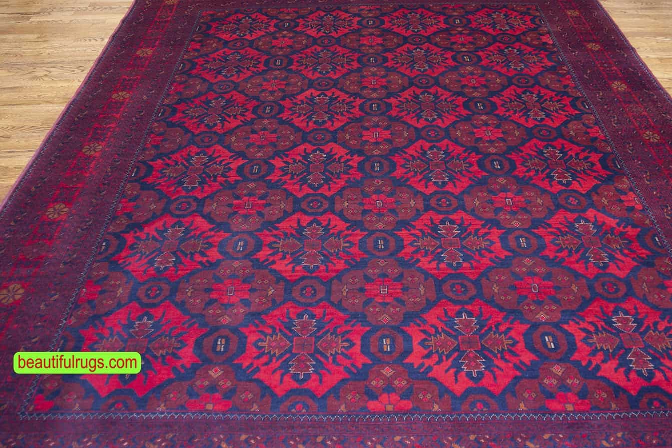 Large size handmade Kunduz Aghan rug, tribal rug in red color. Size 8.3x11.4.