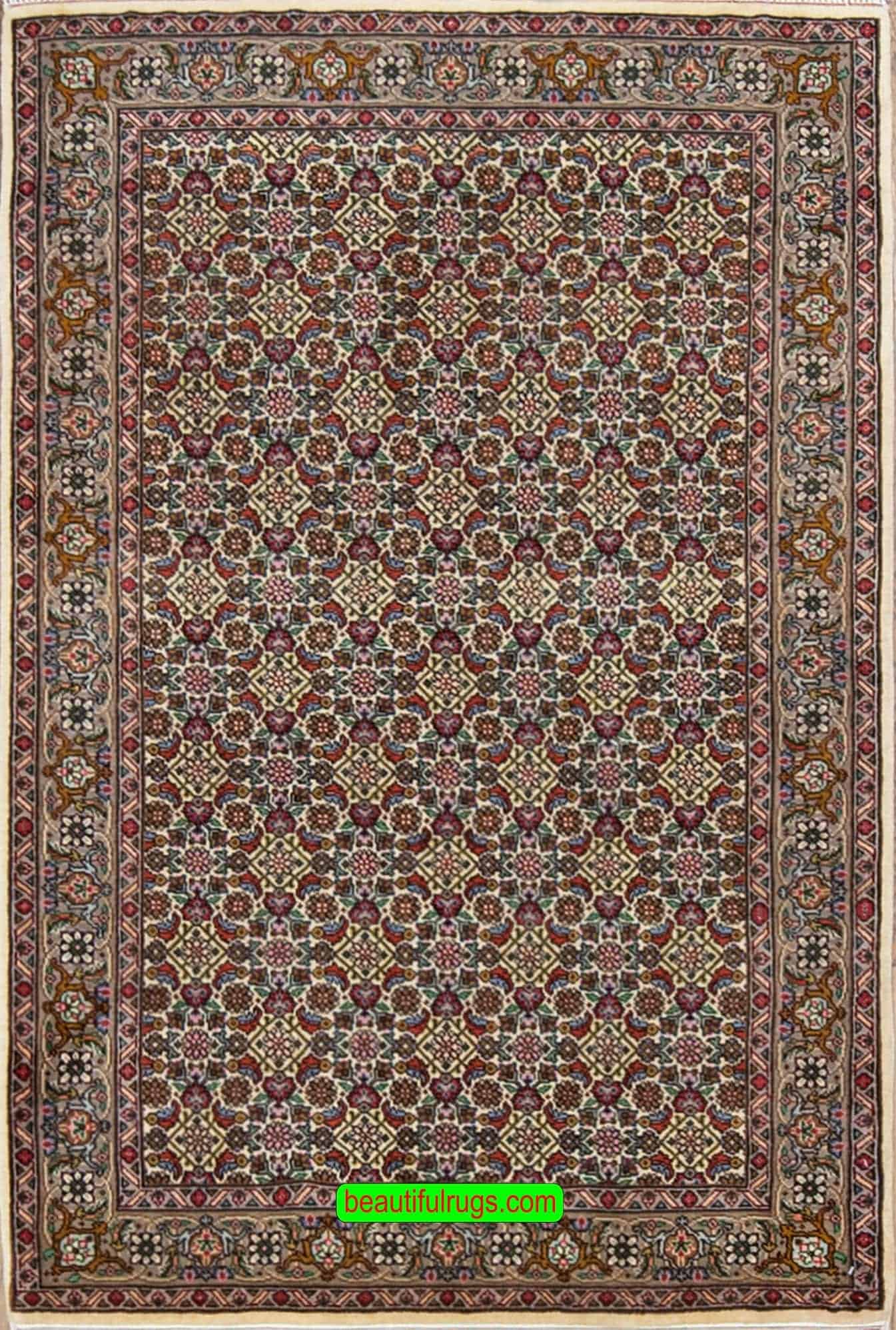 2606- Wool area rug, handmade Persian Tabriz with pastel beige, old Persian rug in great condition.