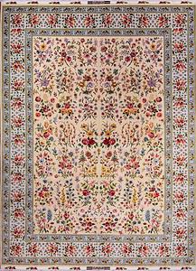 A gorgeous hand knotted multicolor floral Persian Tabriz rug woven by Azim Zadeh the renowned weaver of Iran. Size 9.6x13.6.