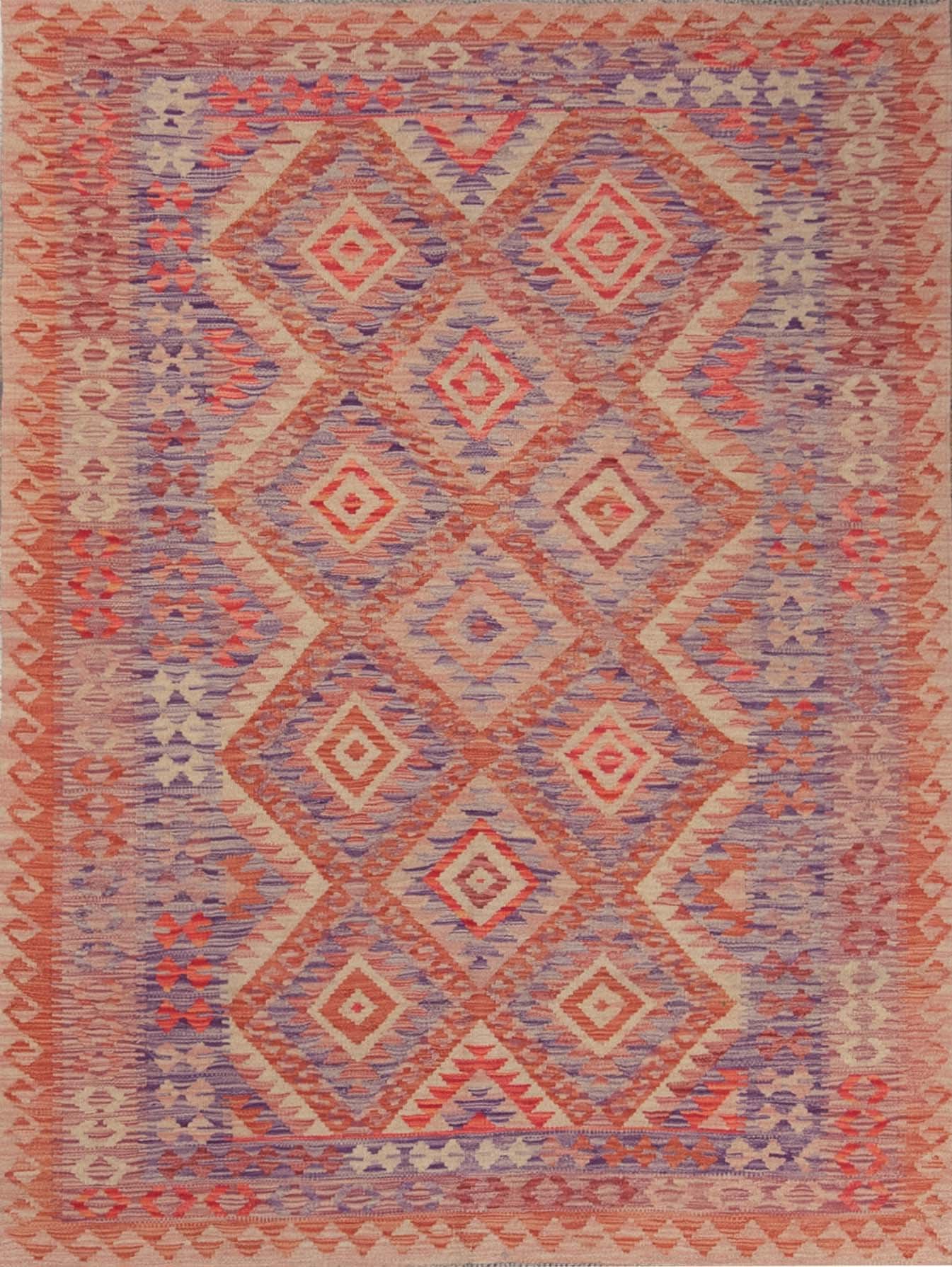 3100- Handwoven reversible wool kilim rug in geometric style imported from Pakistan. Kilim size 4.10x6.3.  