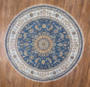 3163- 9 ft round rug. Beautiful handmade Persian Nain style rug expertly crafted in India. The actual rug size is 9.3x9.3.