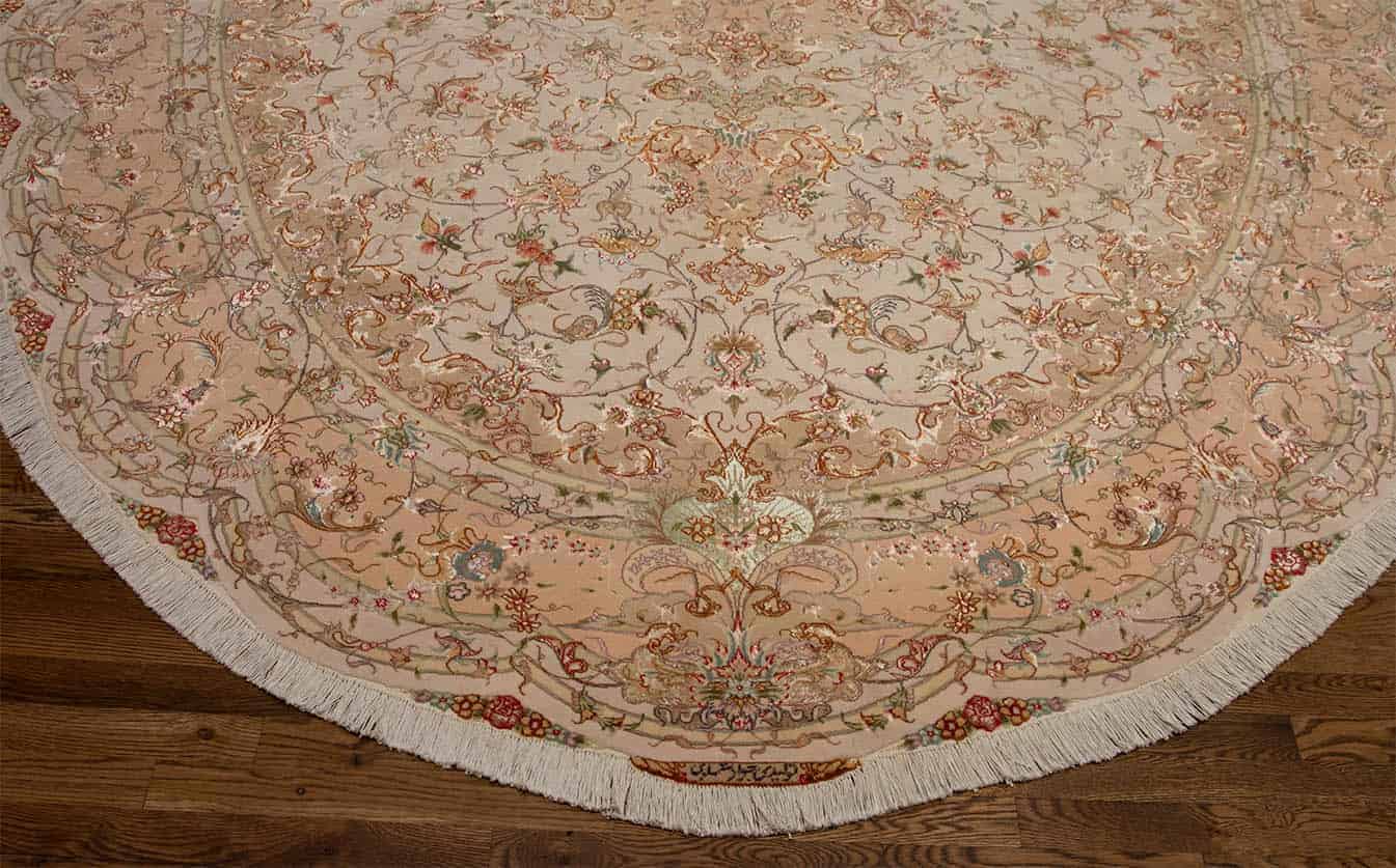 3227- A gorgeous large size handmade Persian Tabriz oval rug made of wool and silk masterfully color coordinated. Size 8.5x11.10.  