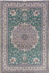 Persian Nain rug. Hand knotted Habibian Nain wool and silk rug in green color with 625 KPSI. Size 6.9x10.