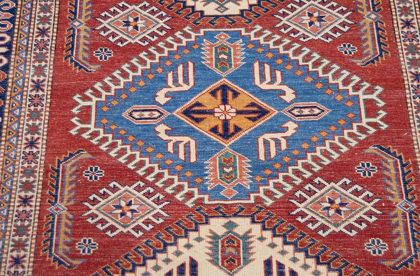 7363- Rustic area rug. Handmade geometric style Kazak rug made in Pakistan. Size 4.2x5.10. Backside image. 