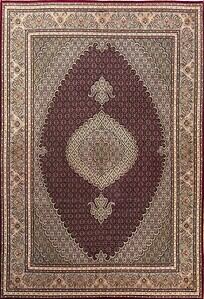 Medium rugs vesatile for variety of spaces. Persian Tabriz wool and silk rug in red color and medium size.