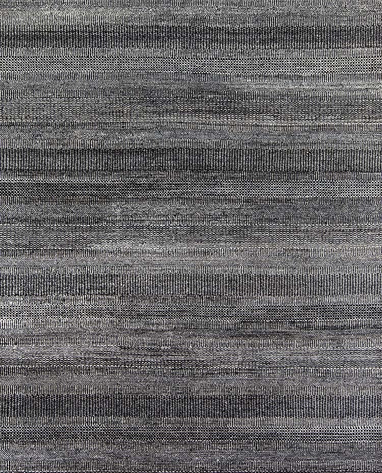 Black and white area rugs with stripes made of combination of wool and synthetic fibers. Size 8x9.8.