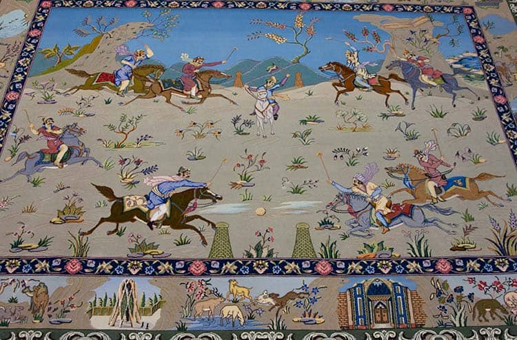 Magnificent Polo rug, a precious souvenir that resonates with the passion of polo lovers. Handmade Persian rug with polo scene. Rug size 6.9x5.