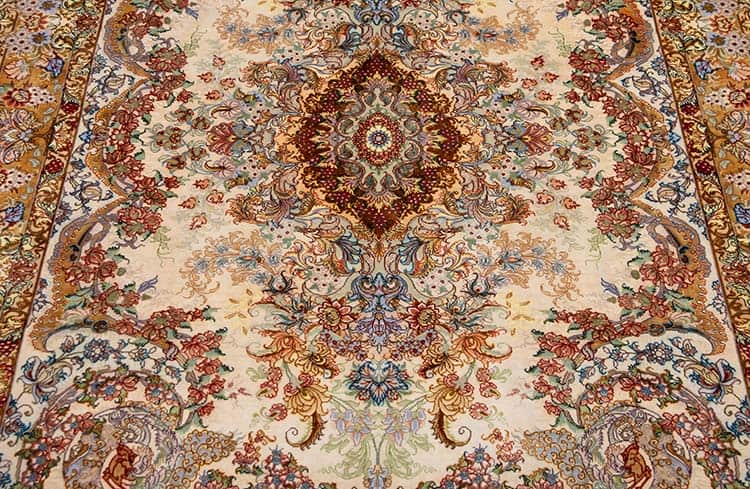 Silk Persian carpet in beige and brown colors. Floral hand woven Iranian carpet. Size 4.10x7.3.