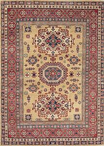Example of oriental rugs from Caspian regions, handmade Kazak style with Caucasian motifs in chartreuse color. 