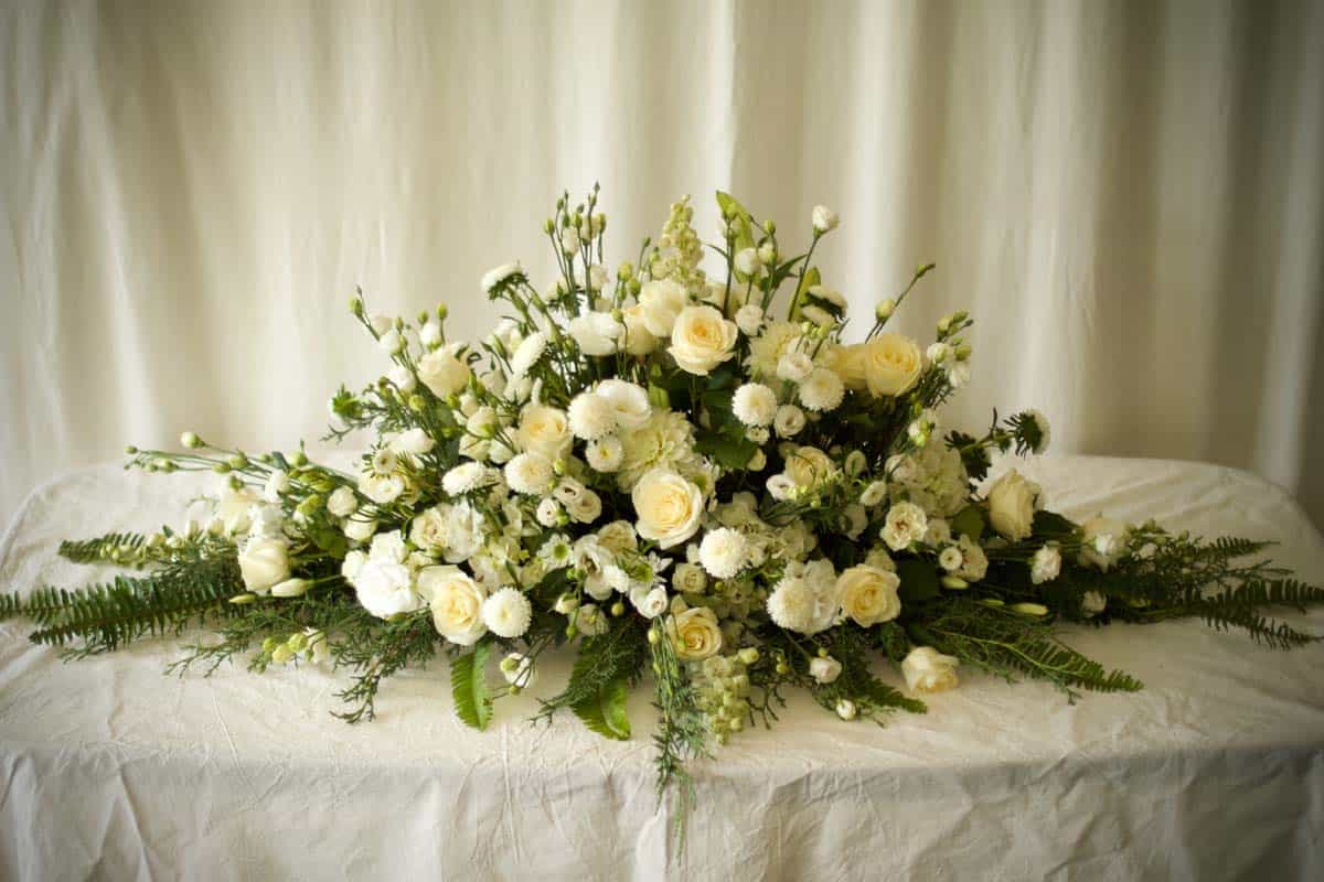 Elegant White Funeral Casket Spray
