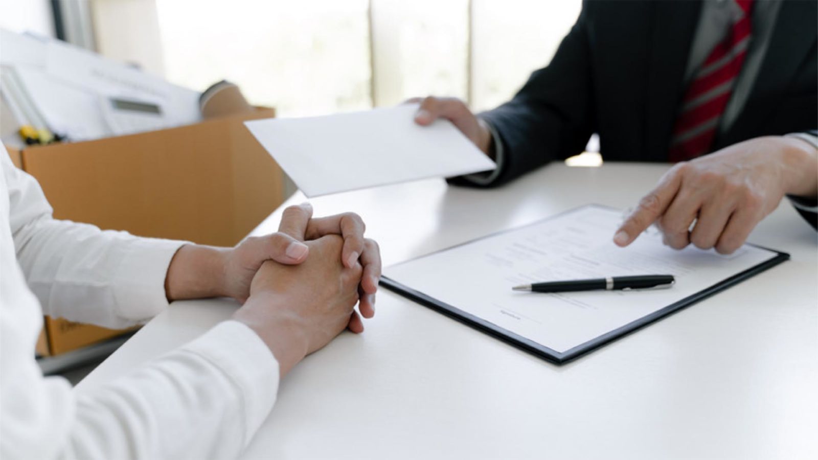 discussing contracts in a meeting