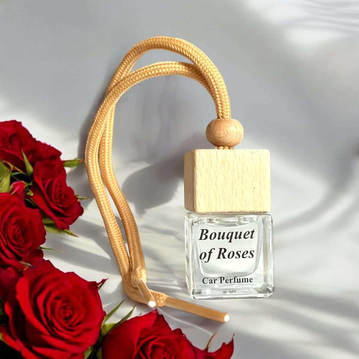 Car diffuser with roses scent and wooden cap.