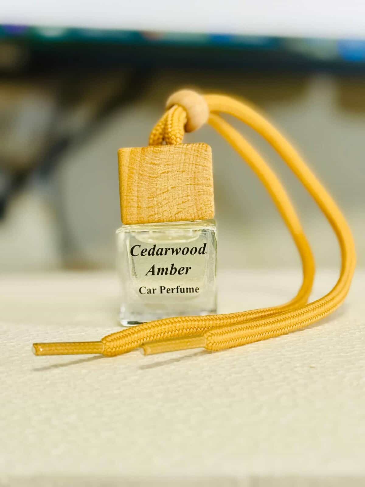 Cedarwood Amber car diffuser with essential oil scent for a calming atmosphere.