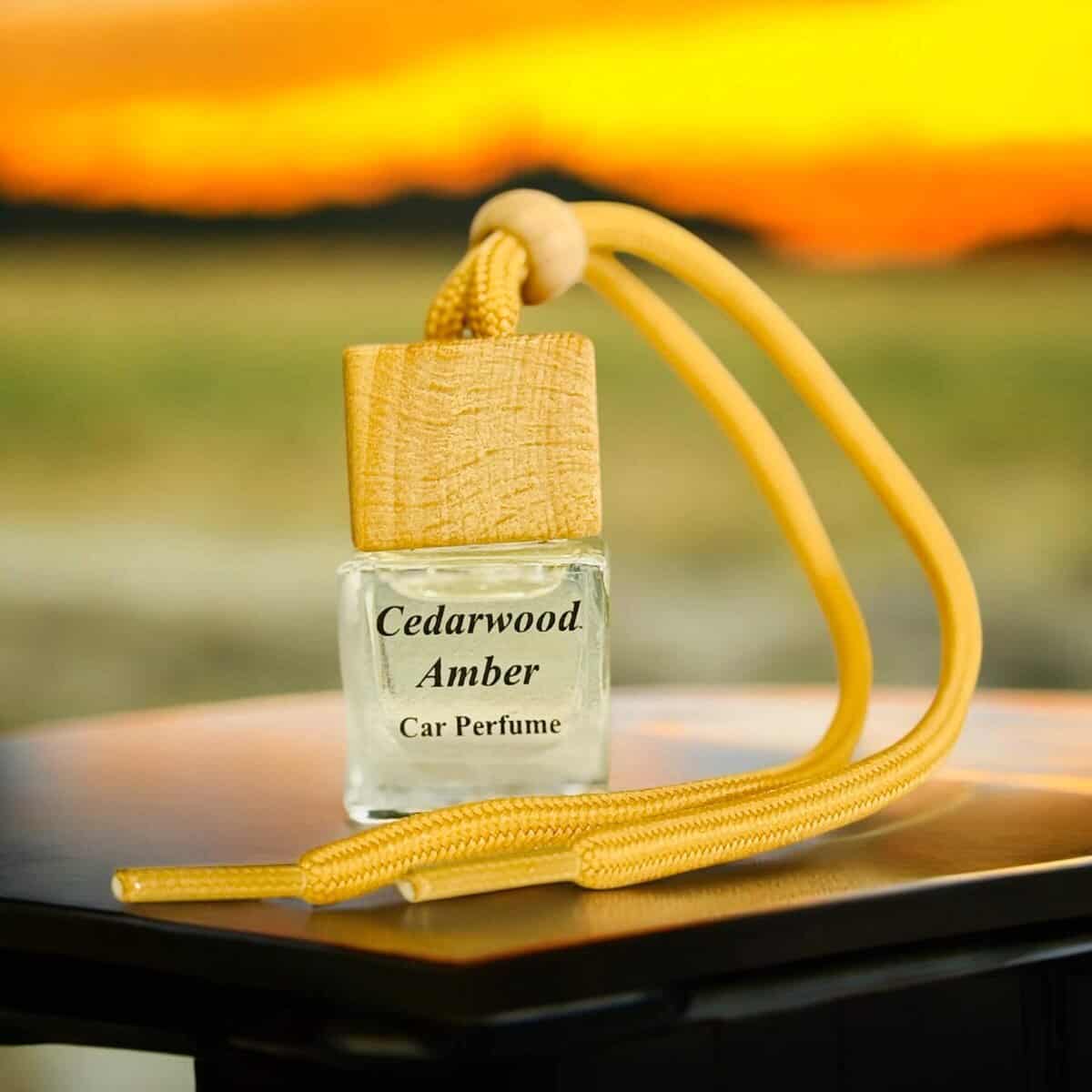 Cedarwood Amber car diffuser with essential oil scent for a relaxing drive. Perfect for enhancing yo.
