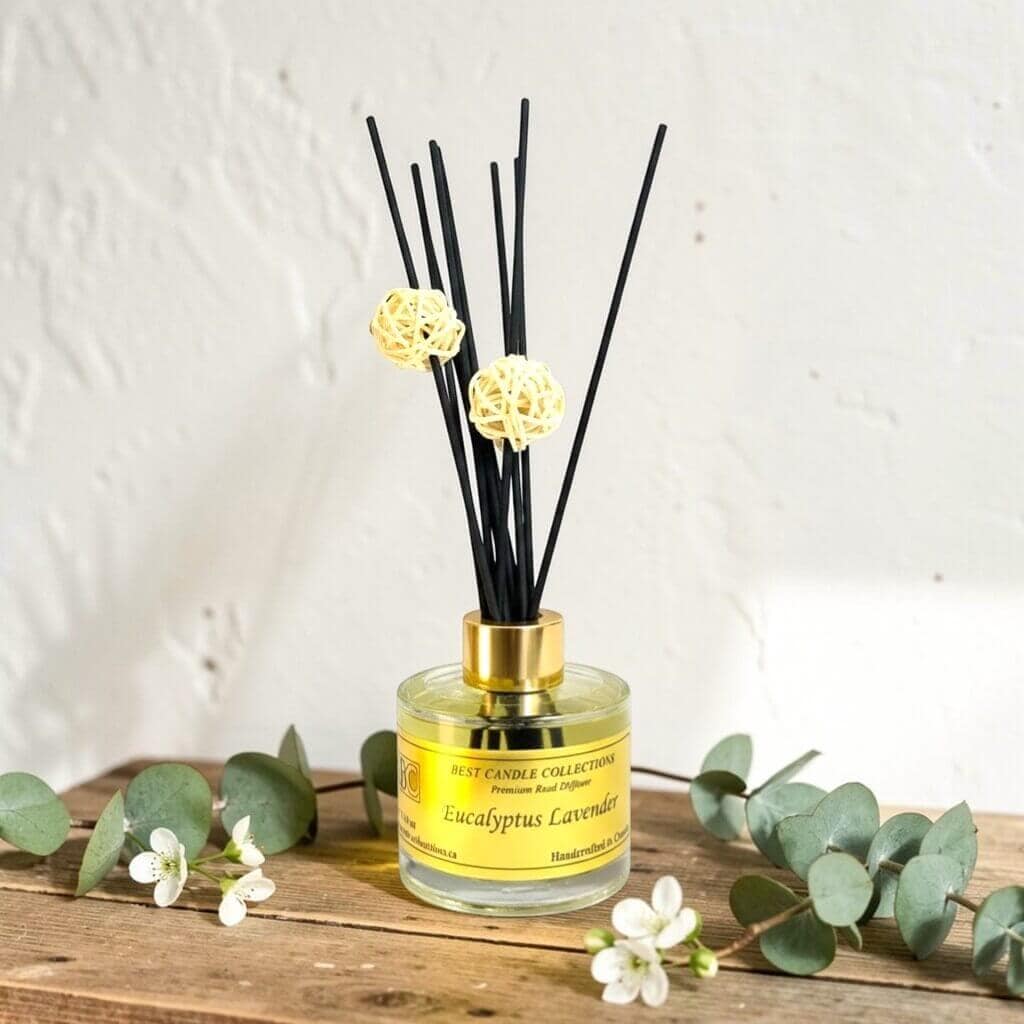 Eucalyptus Lavender reed diffuser with black reeds and decorative balls.