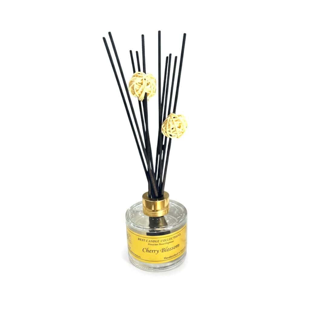 Reed diffuser with cherry blossom scent and decorative rattan balls. Perfect for adding a floral aro.
