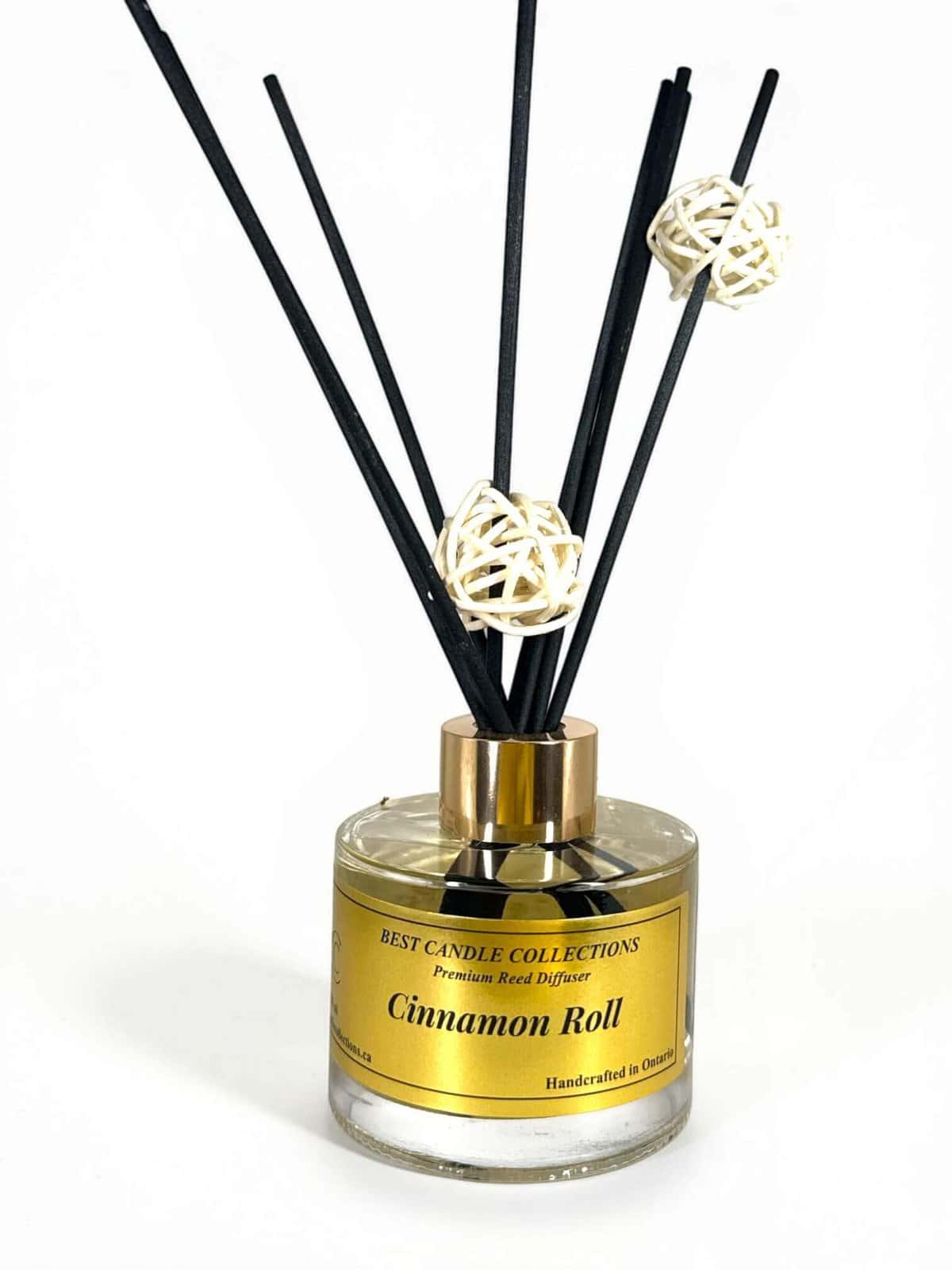 Reed diffuser with cinnamon roll scent for home fragrance. Elegant design enhances any space with wa.
