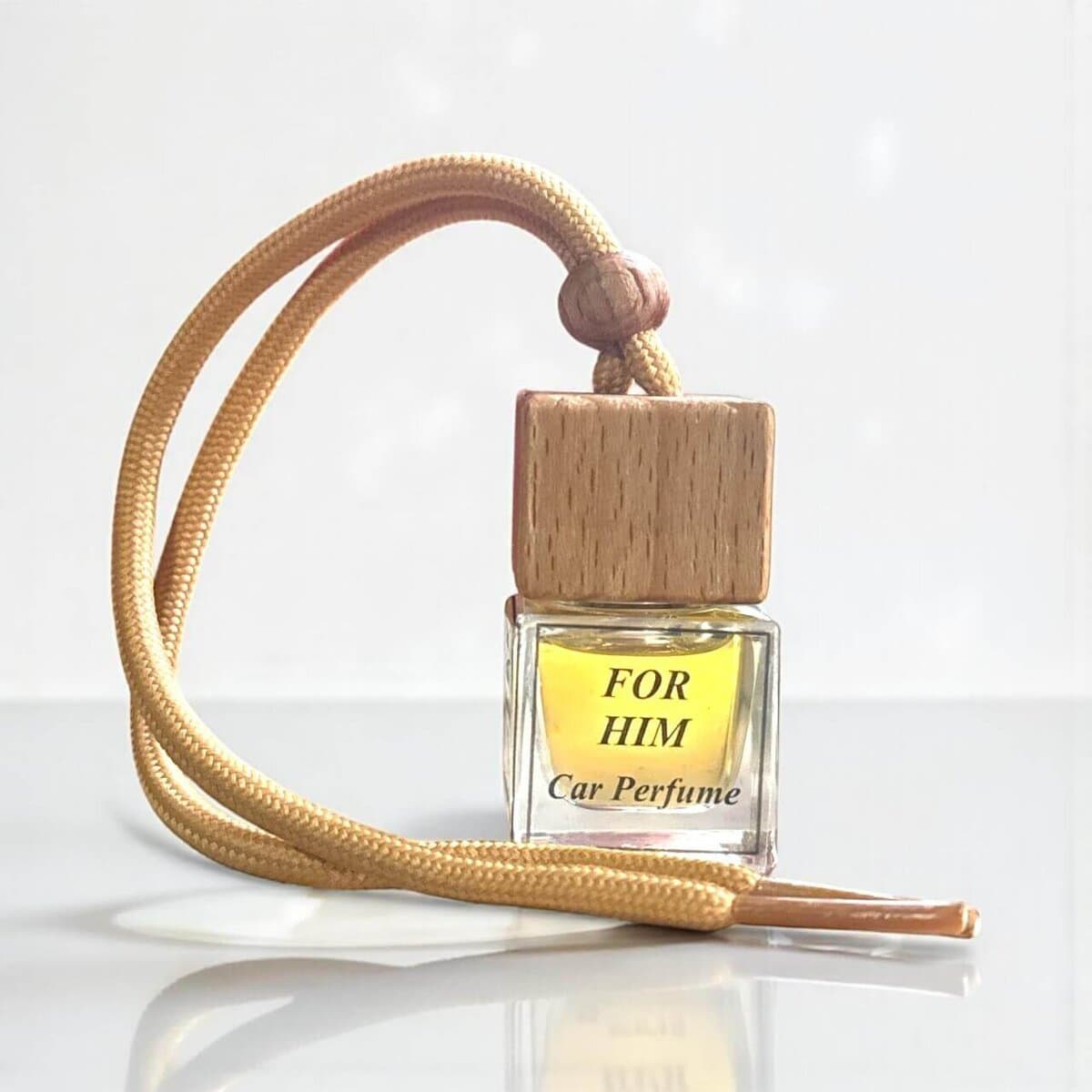 Car diffuser with wooden cap and beige cord, scented for him.